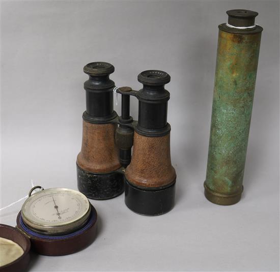 A pocket barometer by J & W E Archbutt, in leather case and two other items,